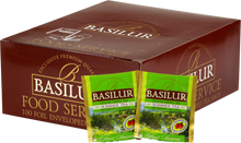 Opakowanie herbaty Basilur Summer Tea 100 x 1,5 g z zieloną herbatą cejlońską i aromatem poziomki.