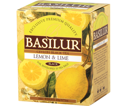 Perspektywiczne ujęcie pudełka herbaty Basilur Lemon & Lime z cytrusową grafiką.