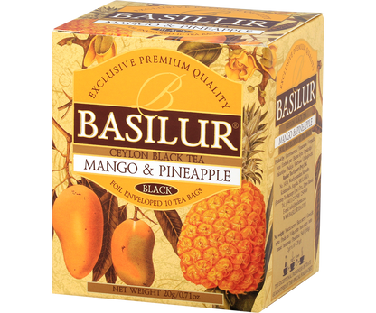 Pudełko herbaty Basilur Mango & Pineapple z grafiką mango i ananasa.