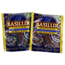 Saszetki herbaty Basilur Magic Nights z orientalnym motywem i logo Basilur.