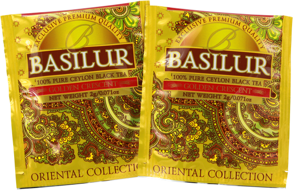 Saszetki herbaty Basilur Golden Crescent z eleganckim, złotym motywem.