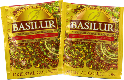 Saszetki herbaty Basilur Golden Crescent z eleganckim, złotym motywem.