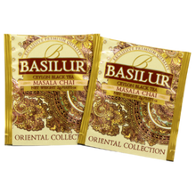Saszetki herbaty Basilur Masala Chai z orientalnym motywem w kolorach złota i brązu.