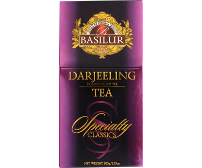 Przód opakowania Basilur Darjeeling w fioletowo-złotej tonacji.
