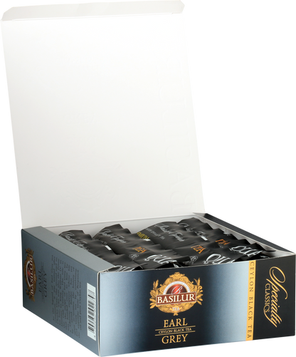 Otwarta paczka Basilur Earl Grey – koperty z herbatą w eleganckim opakowaniu.