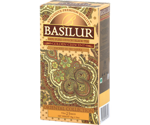 Opakowanie herbaty Basilur Golden Crescent z kolekcji Oriental Collection w złoto-brązowych barwach.