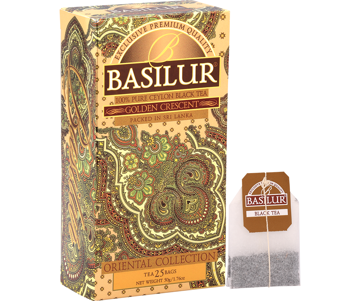 Pudełko Basilur Golden Crescent wraz z torebką herbaty z logo marki.