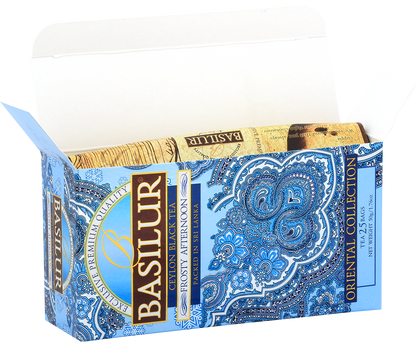 Otwarta herbata Basilur Frosty Afternoon w ozdobnym, błękitnym pudełku z orientalnym wzorem.