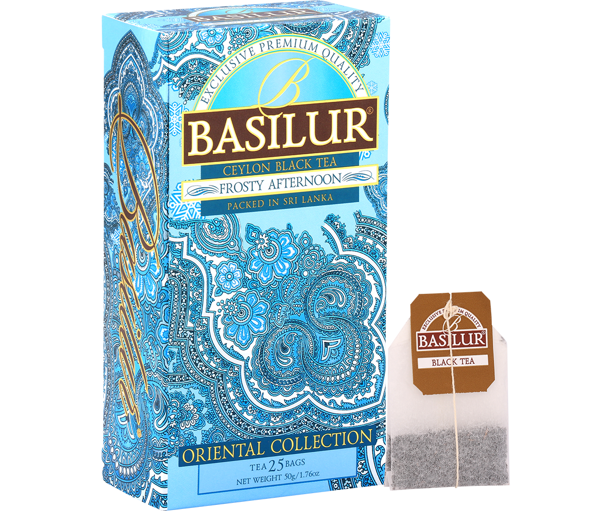 Herbata Basilur Frosty Afternoon z torebką herbaty obok opakowania.