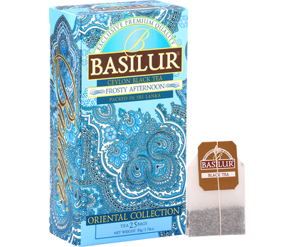Herbata Basilur Frosty Afternoon z torebką herbaty obok opakowania.