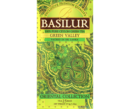 Przód opakowania herbaty Basilur Green Valley – eleganckie zielono-złote wzornictwo.