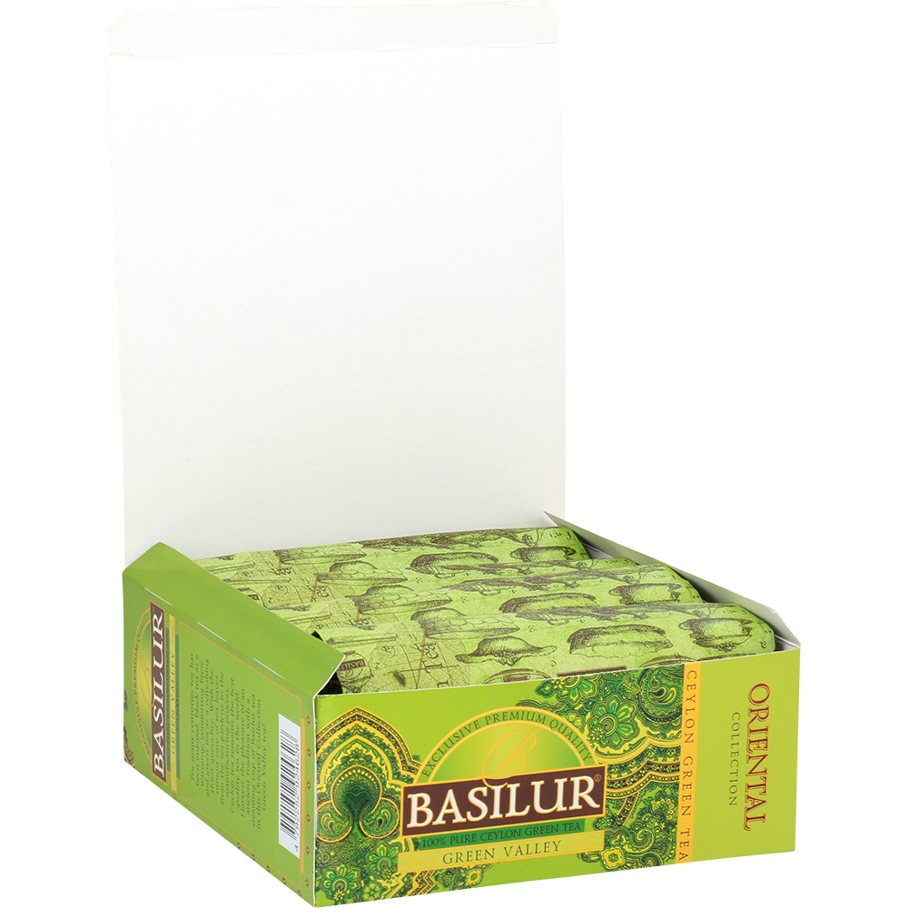 Otwarte opakowanie Basilur Green Valley z indywidualnie pakowanymi torebkami zielonej herbaty cejlońskiej.