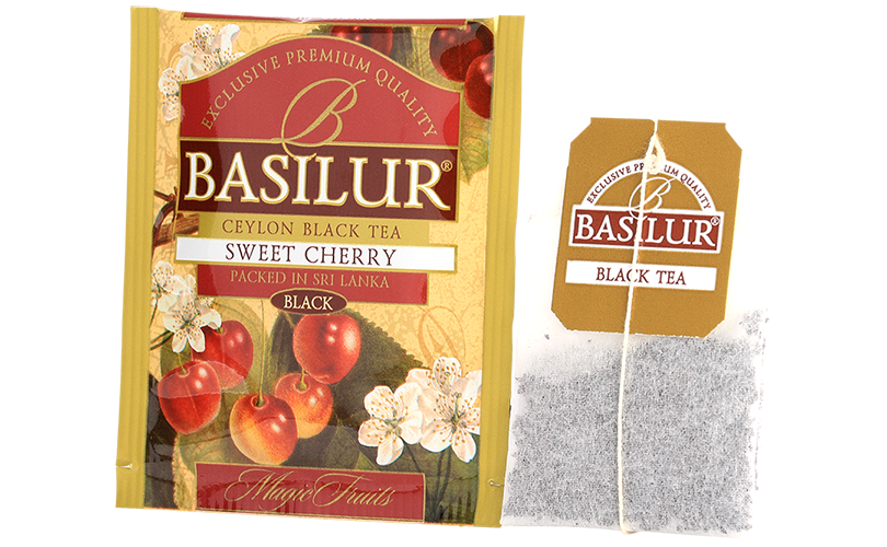 Koperta i torebka herbaty Basilur Sweet Cherry – czarna herbata cejlońska o smaku słodkiej wiśni.
