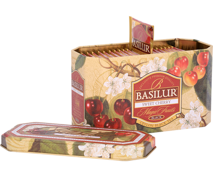 Otwarta puszka Basilur Sweet Cherry z widocznymi kopertami herbaty o wiśniowym aromacie.