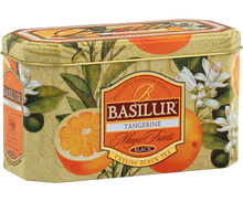 Herbata Basilur Tangerine w ozdobnej puszce z motywem mandarynek i kwiatów cytrusowych.