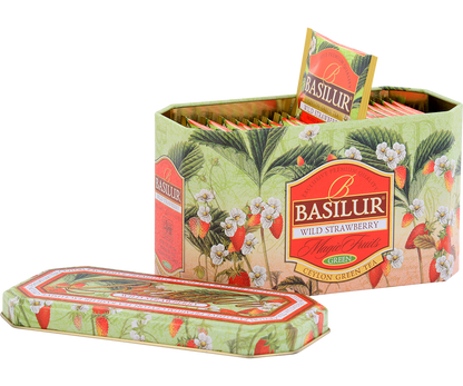 Otwarta puszka Basilur Wild Strawberry z kopertami herbaty o truskawkowym aromacie.