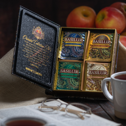 Zestaw Basilur Oriental Collection No. 1 z herbatami w torebkach i filiżankami.