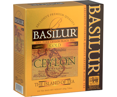 Herbata Basilur Gold – złote opakowanie z mapą Cejlonu, 100 torebek herbaty.