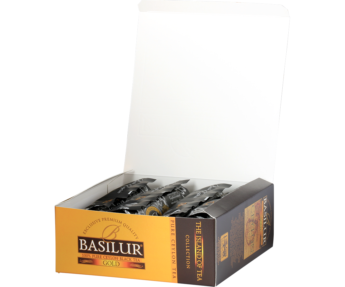Otwarte pudełko Basilur Gold z torebkami czarnej herbaty cejlońskiej.