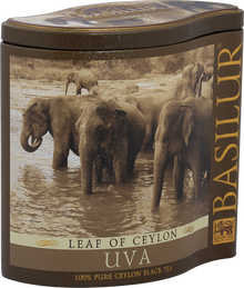 Metalowa puszka herbaty Basilur Uva z motywem słoni w rzece.