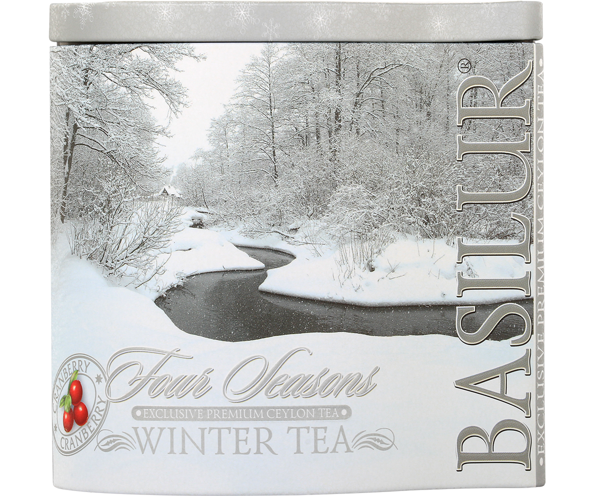 Front puszki Basilur Winter Tea z motywem śnieżnego krajobrazu, herbata cejlońska z żurawiną.