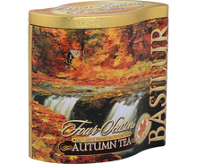 Bok puszki Basilur Autumn Tea z jesiennym pejzażem i logo marki