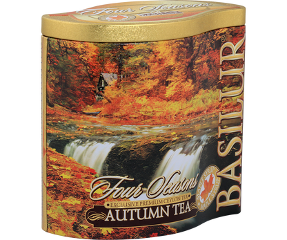Bok puszki Basilur Autumn Tea z jesiennym pejzażem i logo marki
