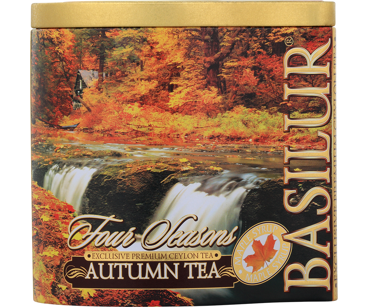 Zbliżenie na puszkę Basilur Autumn Tea z motywem jesiennych liści i wodospadu