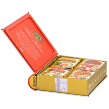 Otwarte pudełko Basilur Fruit Infusions vol. 2 – widoczne cztery rodzaje herbat w kopertach.