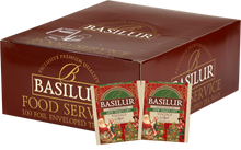 Zestaw Basilur New Year’s Gift – 100 torebek czarnej herbaty cejlońskiej z motywem Nowego Roku i Świętego Mikołaja.