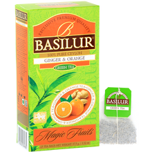 Saszetka Basilur Ginger & Orange obok kartonika zielonej herbaty.