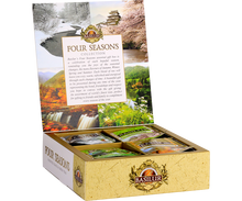 Otwarty zestaw Basilur Four Seasons Collection z widocznymi saszetkami herbat