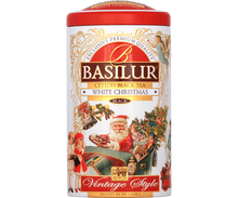Herbata Basilur White Christmas w puszce z motywem Świętego Mikołaja i świątecznymi ilustracjami.
