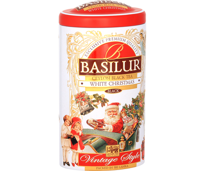 Puszka herbaty Basilur White Christmas z czerwonym wieczkiem i ilustracją bożonarodzeniową.