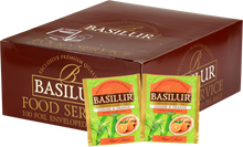 Opakowanie zbiorcze Basilur Ginger & Orange z saszetkami zielonej herbaty z imbirem i pomarańczą.