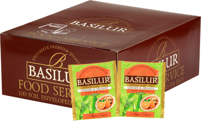 Opakowanie zbiorcze Basilur Ginger & Orange z saszetkami zielonej herbaty z imbirem i pomarańczą.