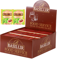 Herbata Basilur Cranberry w ekspozytorze typu food service, 100 kopertowanych torebek zielonej herbaty z żurawiną.