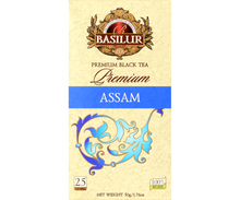 Front pudełka herbaty Basilur Premium Assam z logo i zdobnym motywem roślinnym.