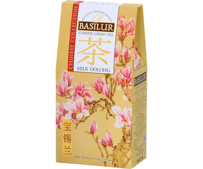 Herbata Basilur Milk Oolong z serii Chinese Collection w eleganckim opakowaniu z motywem magnolii.