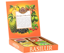 Zestaw herbat Basilur Fruit Infusions & Magic Fruits w eleganckim pudełku z owocowym motywem.