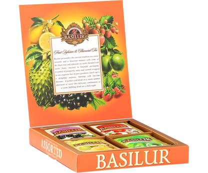 Zestaw herbat Basilur Fruit Infusions & Magic Fruits w eleganckim pudełku z owocowym motywem.