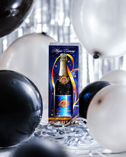 Herbata Basilur Magic Evening w eleganckim opakowaniu w kształcie butelki szampana, idealna na prezent.