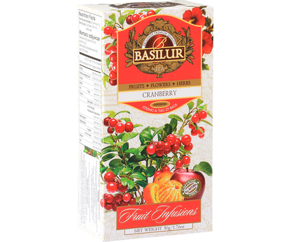 Opakowanie herbaty Basilur Cranberry z ilustracją żurawiny, jabłka i pomarańczy – owocowa herbata bez kofeiny.
