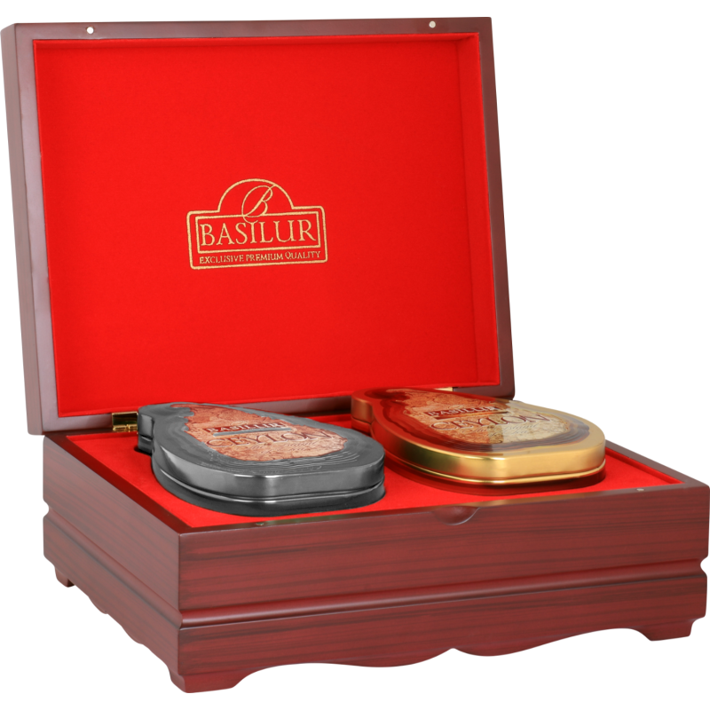 Zestaw herbat Basilur Island of Tea w drewnianej skrzynce z czerwonym wnętrzem.