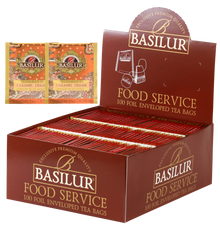 Herbata Basilur Caramel Dream w ekspozytorze typu food service, 100 kopertowanych torebek czarnej herbaty.