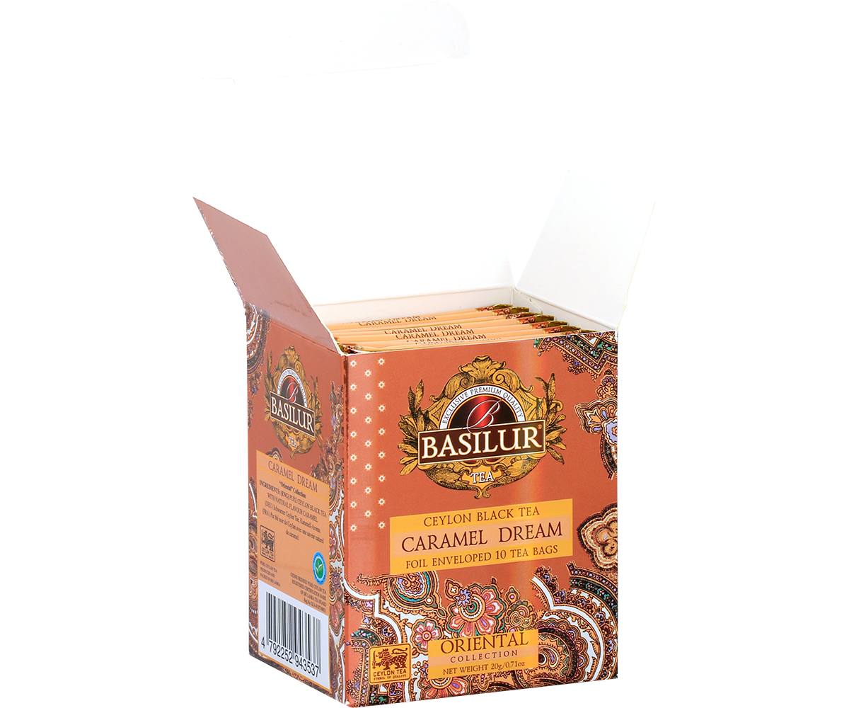 Otwarta paczka Basilur Caramel Dream z widocznymi kopertami herbaty czarnej