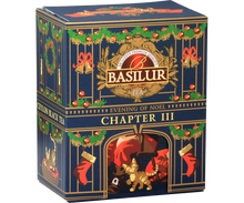 Herbata Basilur Chapter III – opakowanie z motywem świątecznego kominka i złotych detali.