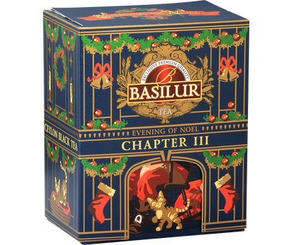 Herbata Basilur Chapter III – opakowanie z motywem świątecznego kominka i złotych detali.