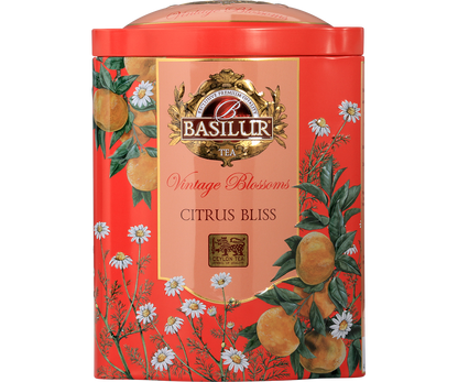 Przód ozdobnej puszki Basilur Citrus Bliss z motywem pomarańczy i kwiatów.