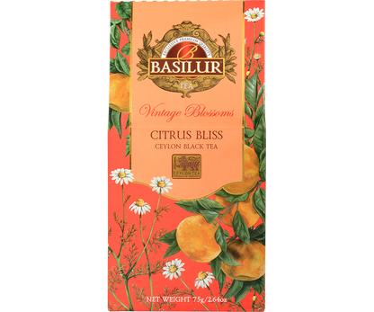 Herbata Basilur Citrus Bliss z kolekcji Vintage Blossoms w ozdobnym pomarańczowym opakowaniu z motywem cytrusów i rumianku.